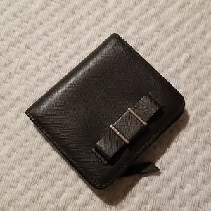 Black Coach bifold wallet with silver hardware